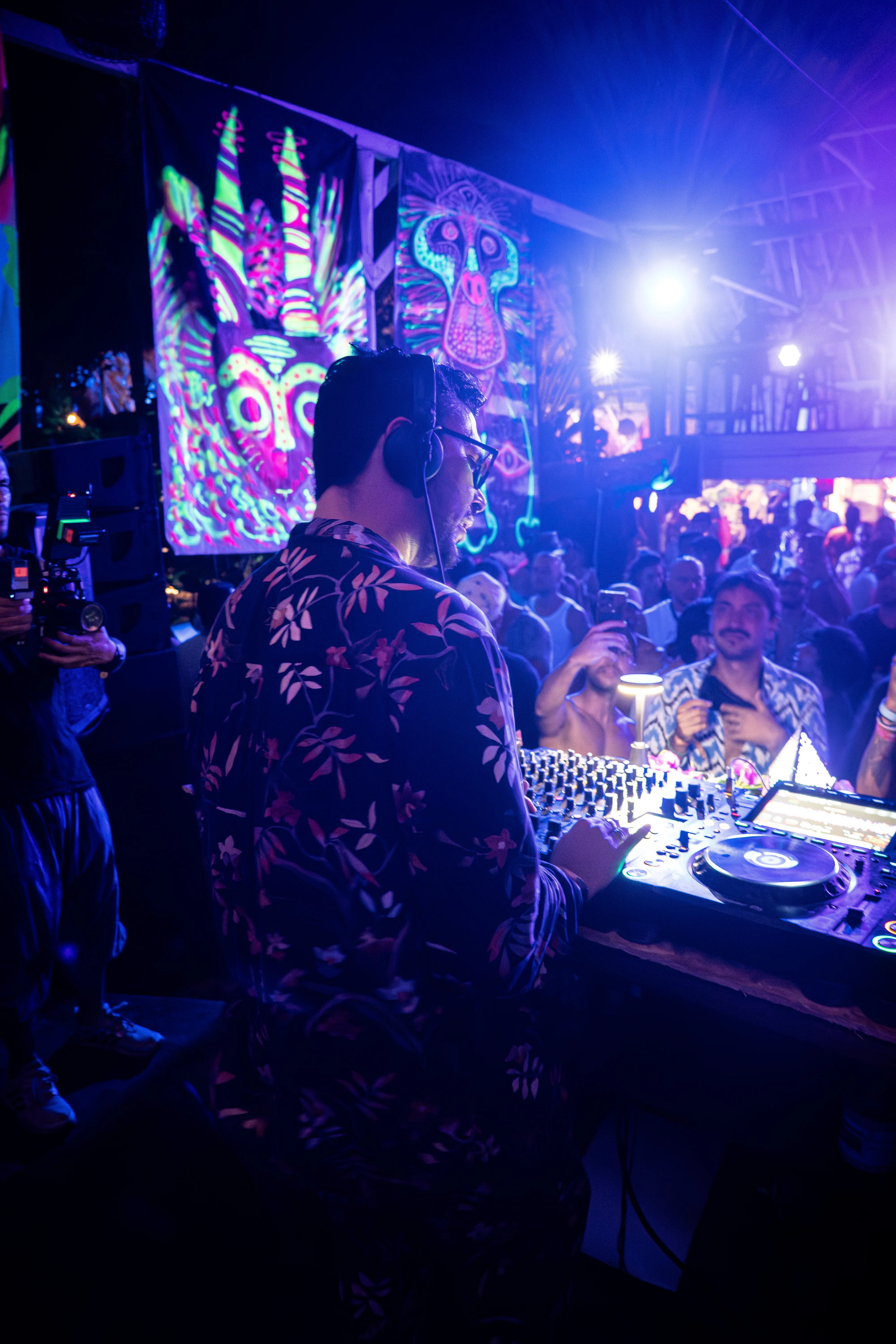 Booth from behind, crowd in front